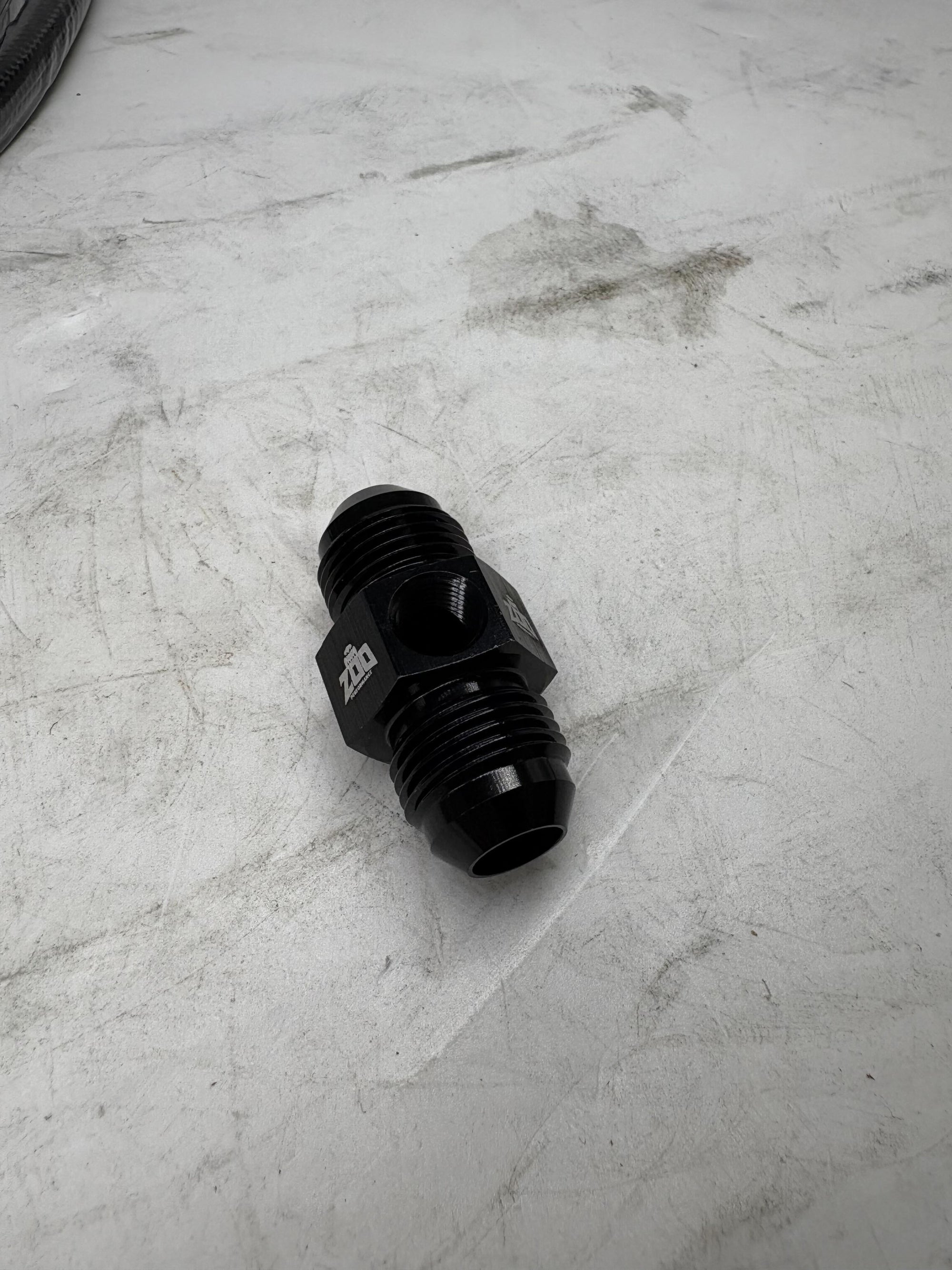 AN FEMALE - MALE UNION ADAPTOR WITH 1/8" PORT